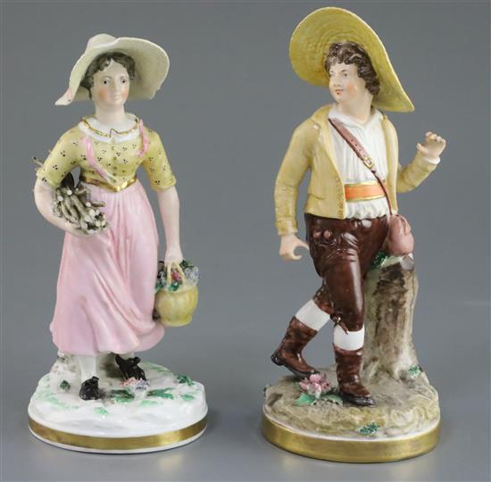 A matched pair of Rockingham porcelain figures of a Swiss boy and Swiss girl, c.1830, h. 21cm and 19.5cm, small losses